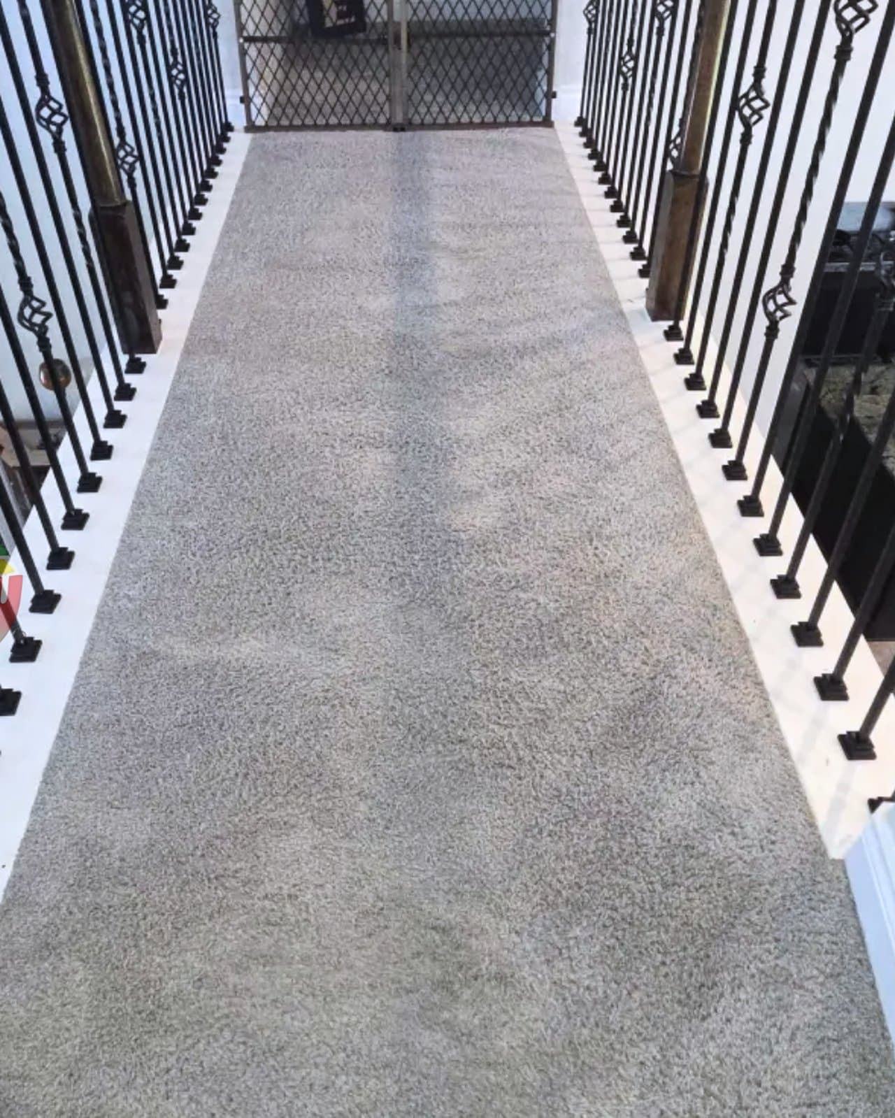 Freshly cleaned carpet on the upstairs landing of a two-story home near Humble, TX
