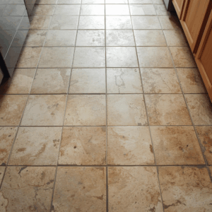 Tile floor with darkened grout lines and cloudy surface from buildup